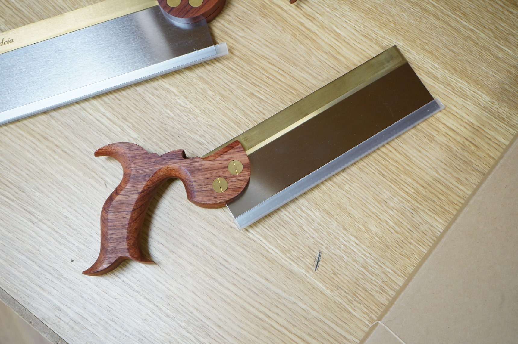 Two boxed Canadian Adria Toolworks Inc. wood saws; a small tenon rip saw, together with a dovetail saw